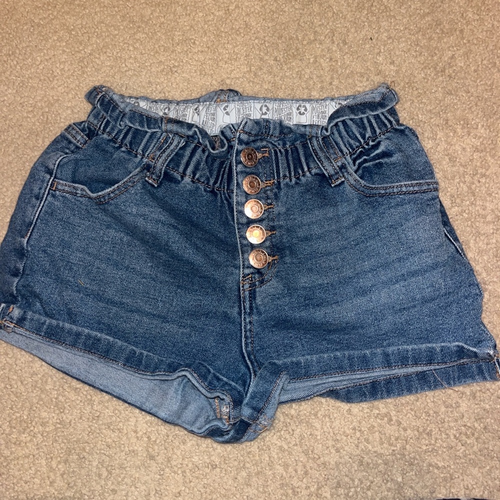 High-waisted denim shorts with stretchy waistband.